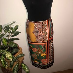 Beautiful red/teal+, poly/spandex with kick pleat.